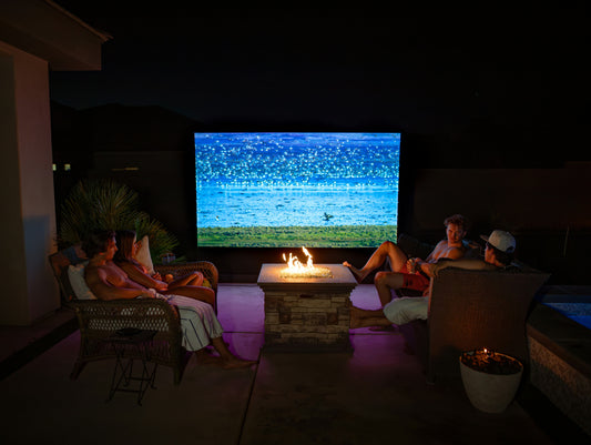 How Portable Projectors Help Create Backyard Theaters